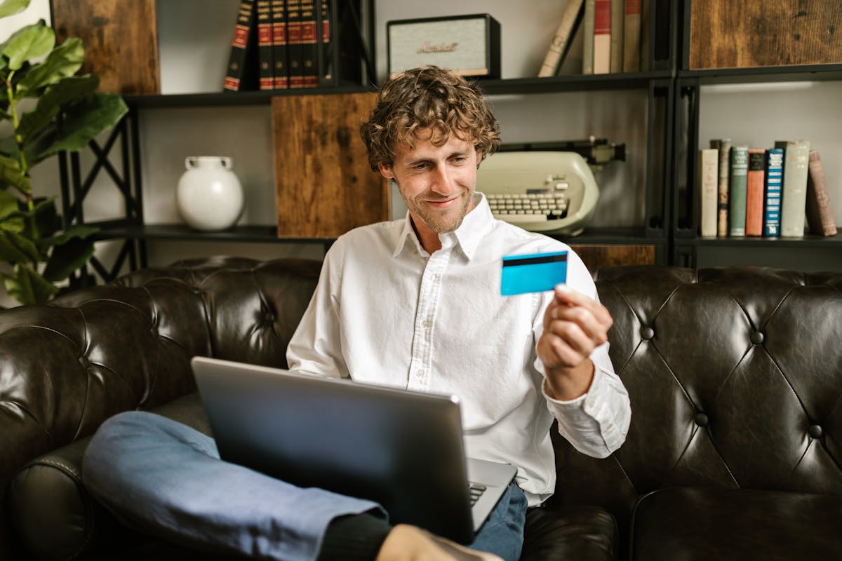 Person checking Visa gift card balance online in the USA